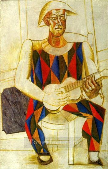 ギターを持って座るハーレクイン 1916 年キュビスト パブロ・ピカソ油絵
